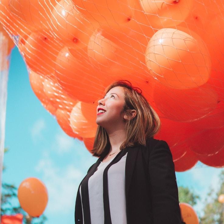 A Client Relations Director discussing corporate gifting strategy with business clients